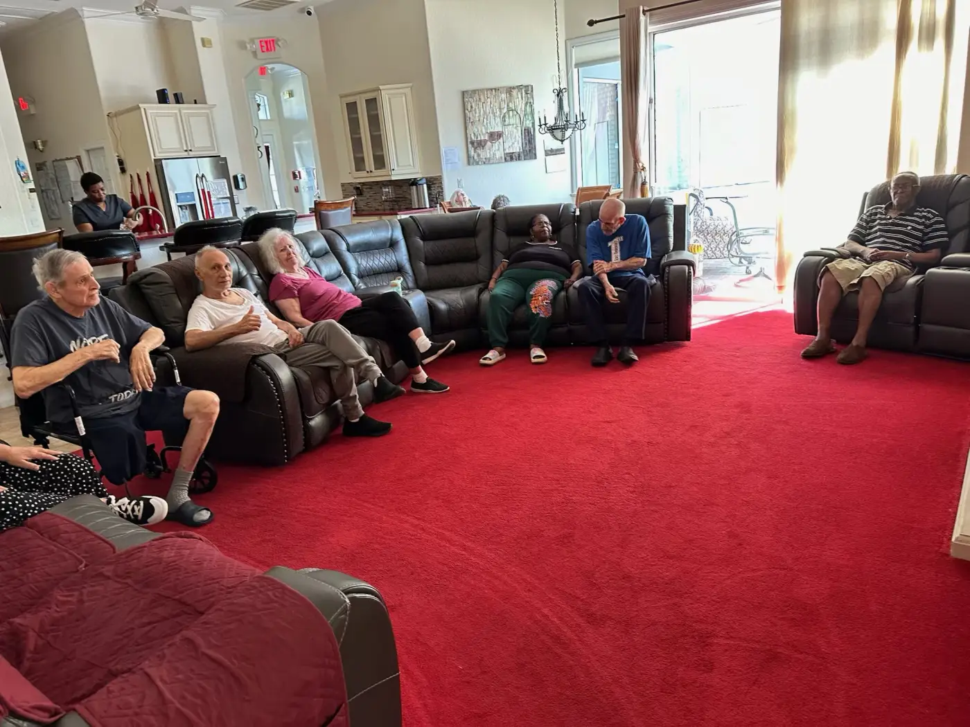 Residents gathered together in the shared living room