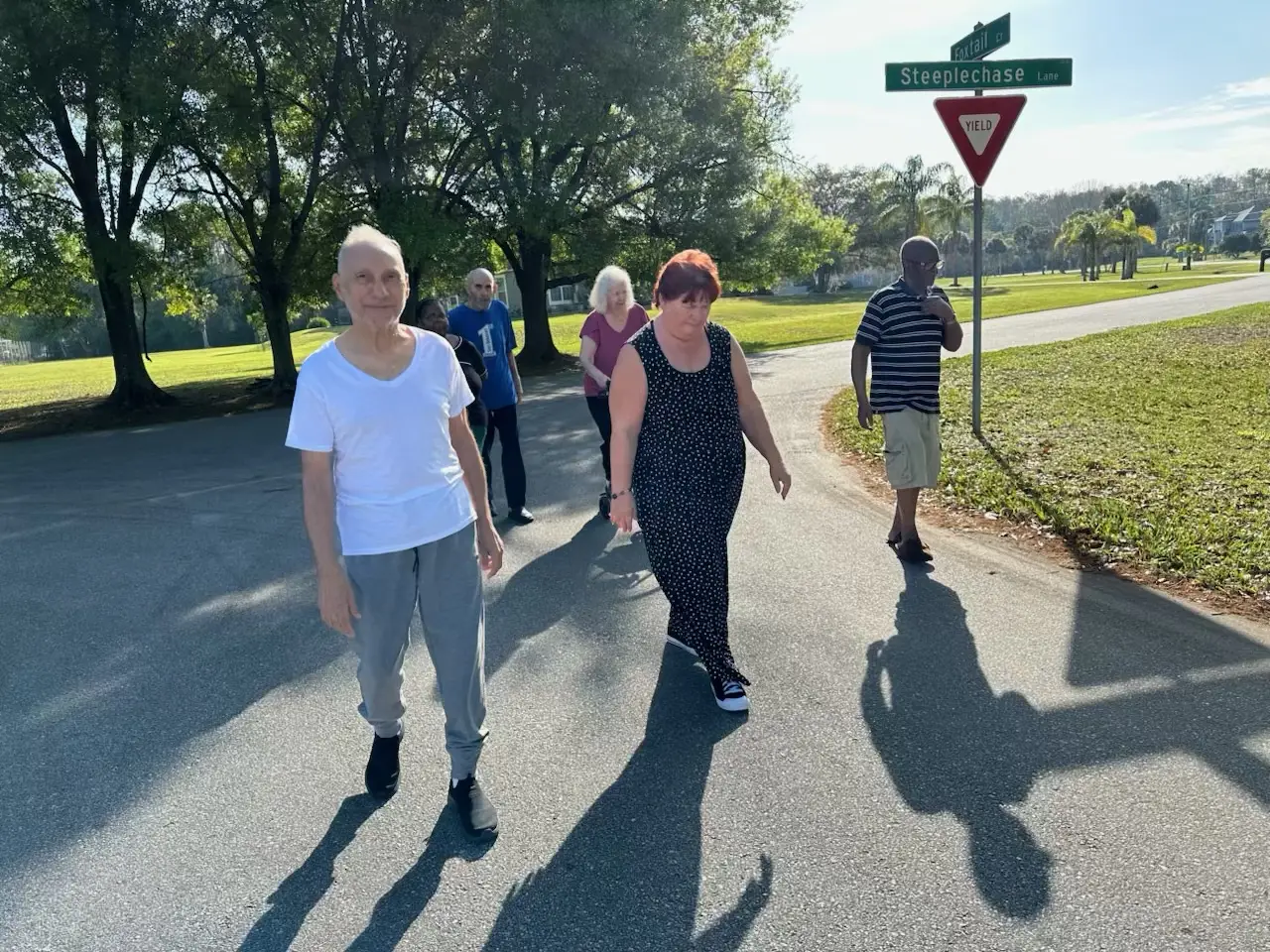 Residents walking together through the Steeplechase neighborhood